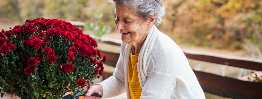 woman outdoors with flowers