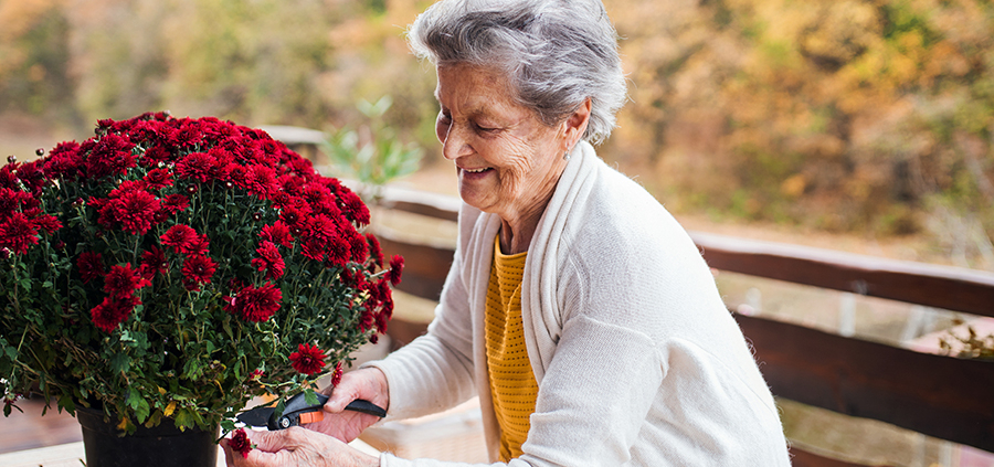 woman outdoors with flowers