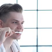 Man brushing teeth