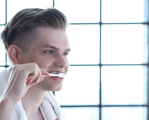 Man brushing teeth