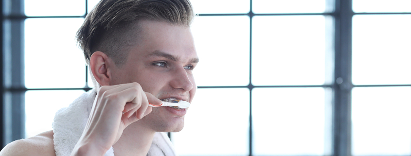 Man brushing teeth